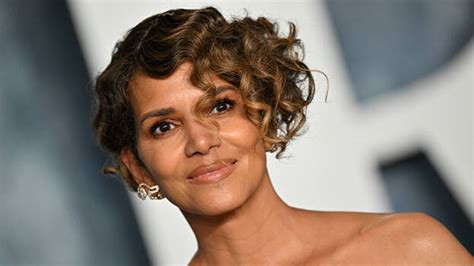 halle berry enjoyed a glass of wine in the nude.|Halle Berry poses nude and sips wine on her balcony